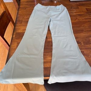 Halara crossover high waisted back pocket super flare leggings